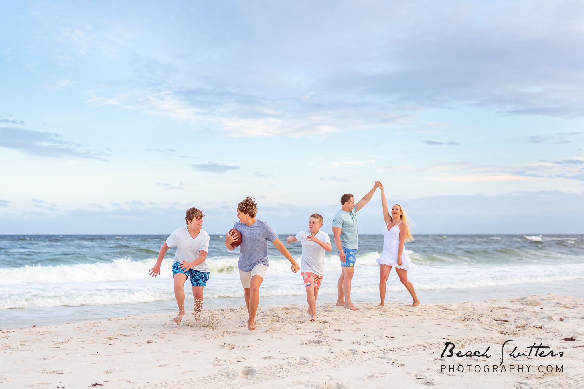 boy mom windy day photos in Orange Beach